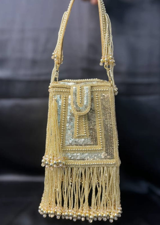 gold sequin tassel potli bag